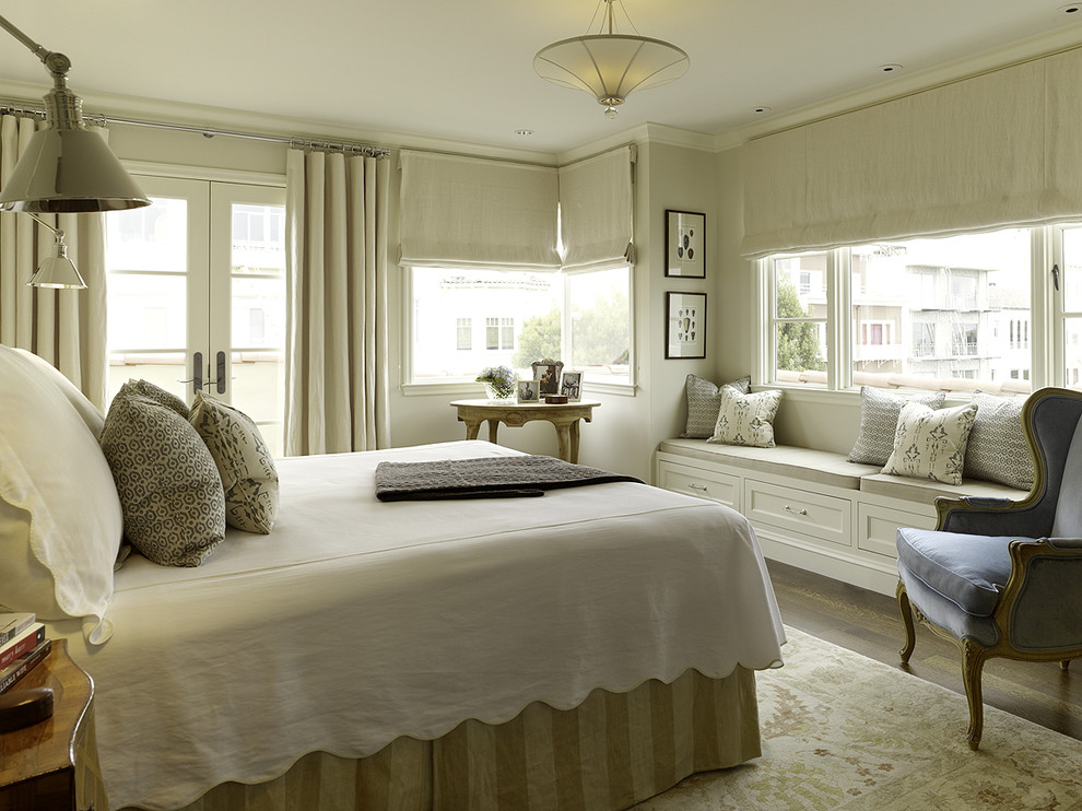 Inspiration for a timeless bedroom remodel in San Francisco with beige walls