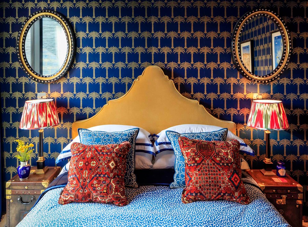 Photo of a medium sized world-inspired guest bedroom in Dublin with blue walls and carpet.