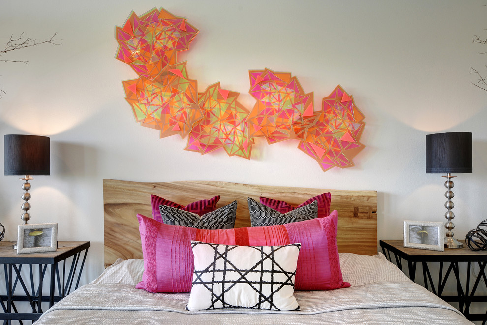 Inspiration for a contemporary bedroom remodel in Austin with white walls
