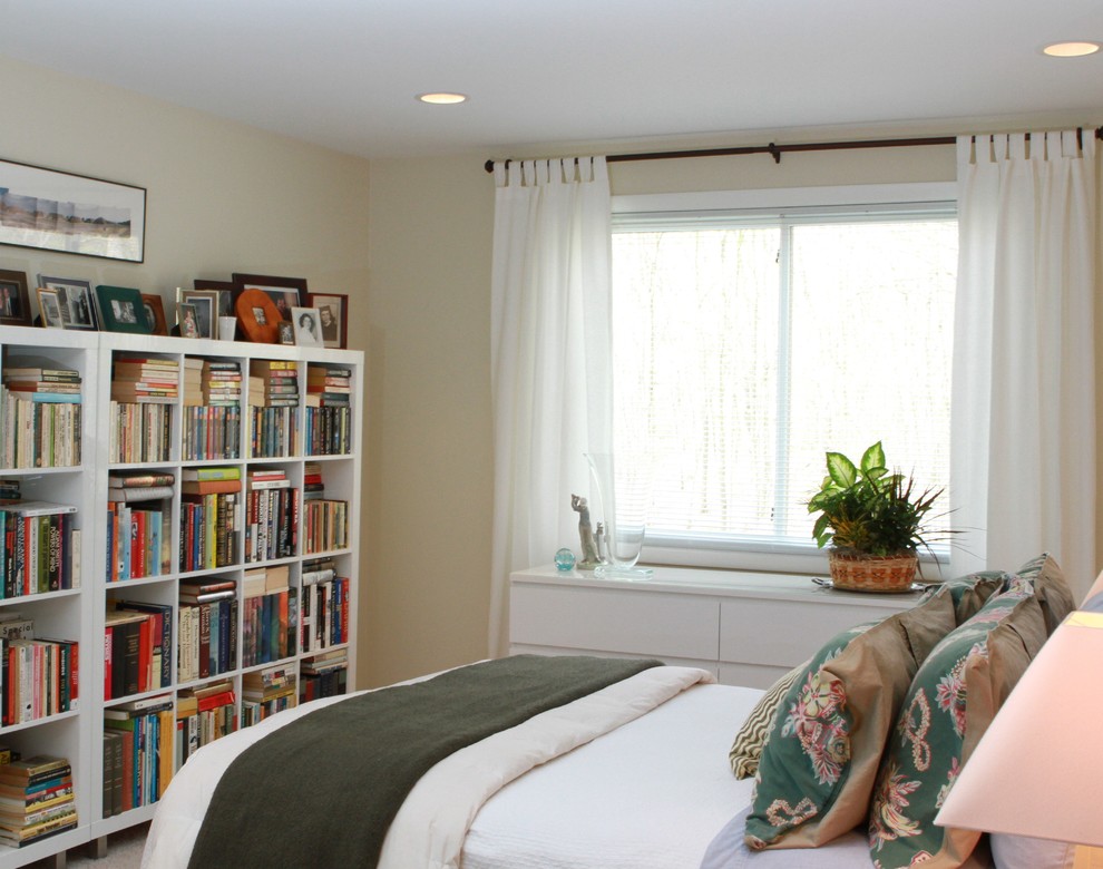 Inspiration for a mid-sized eclectic guest carpeted bedroom remodel in Chicago with yellow walls