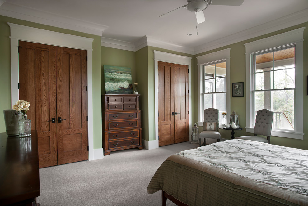 Bedroom - transitional bedroom idea in Charleston with green walls