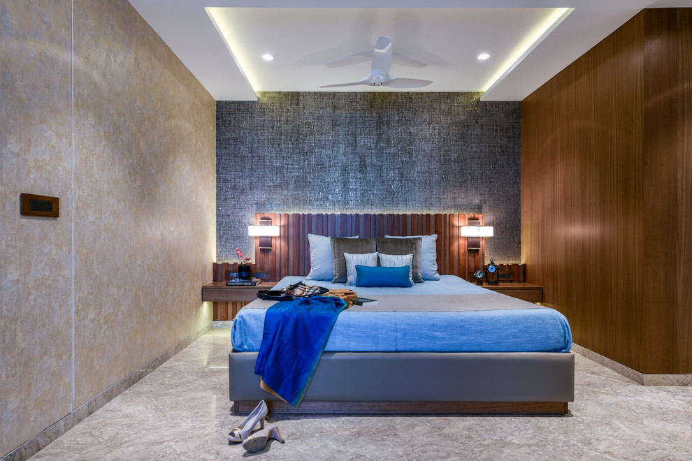 Immagine di una camera da letto contemporanea con pareti grigie e pavimento grigio