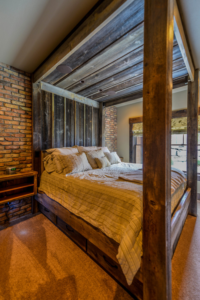 Idee per una camera degli ospiti rustica di medie dimensioni con pareti beige e moquette