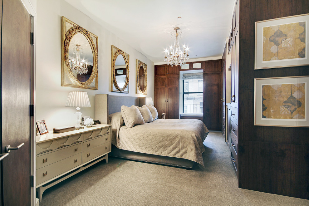 Example of a trendy master carpeted bedroom design in New York with beige walls