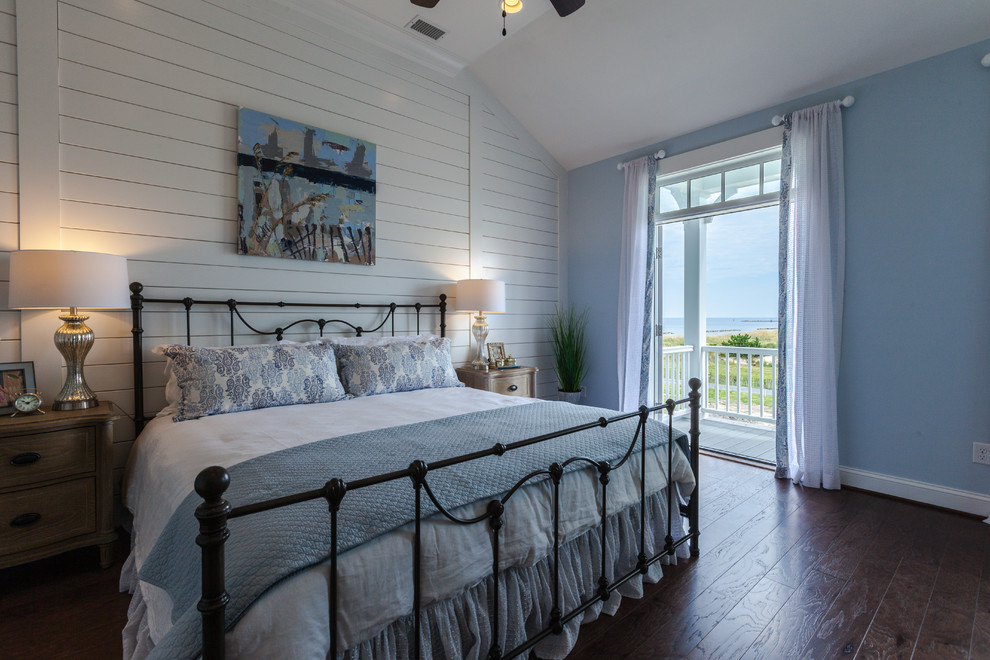 This is an example of a medium sized nautical master bedroom in Other with grey walls, carpet and feature lighting.