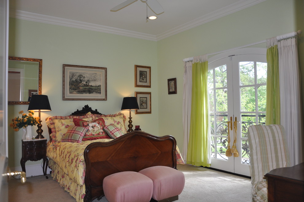 Inspiration for a medium sized classic guest bedroom with green walls and carpet.