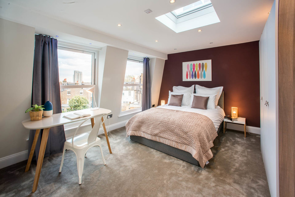 Contemporary bedroom in London with brown walls and carpet.