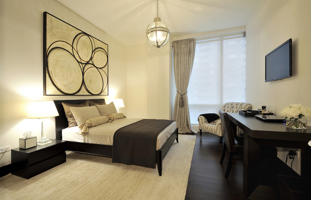 Photo of a medium sized contemporary guest and cream and black bedroom in New York with beige walls, dark hardwood flooring, no fireplace and feature lighting.
