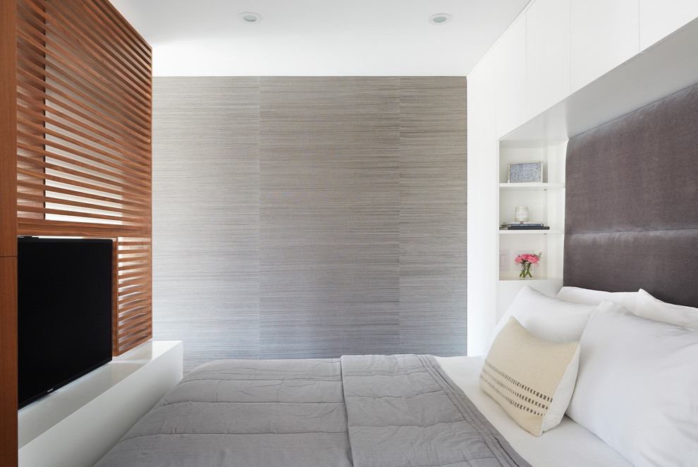 Inspiration for a small contemporary bedroom in New York with white walls.