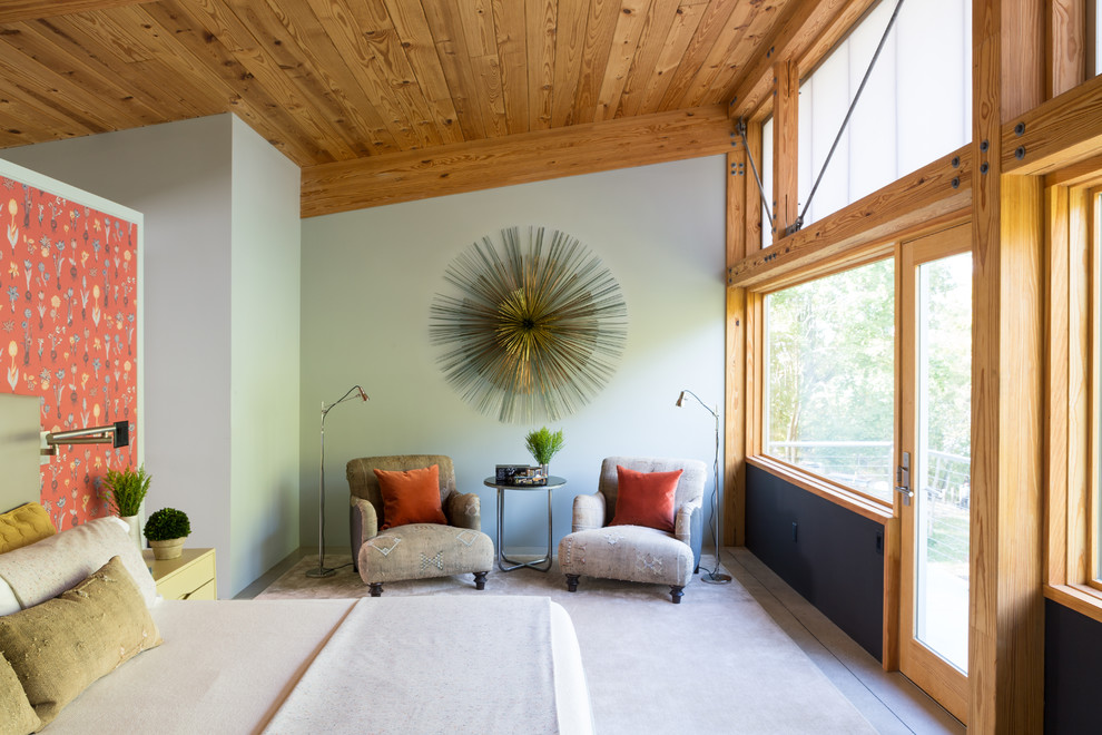 Bedroom - mid-sized contemporary guest medium tone wood floor and brown floor bedroom idea in DC Metro with blue walls and no fireplace