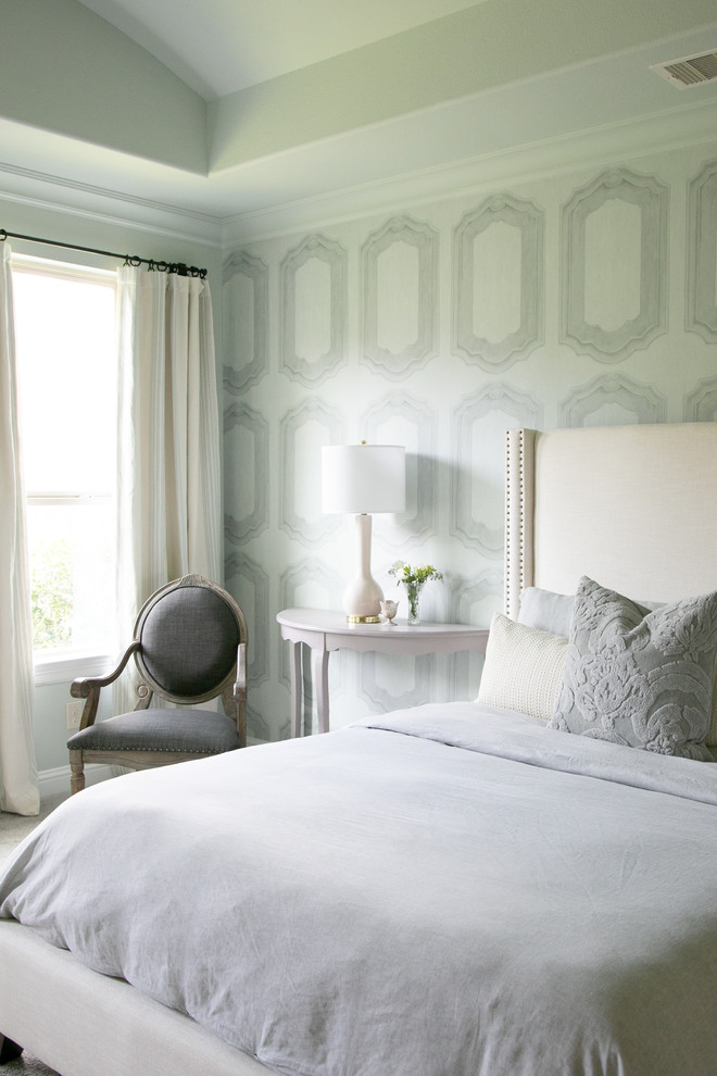 Photo of a traditional bedroom in Houston with grey walls.