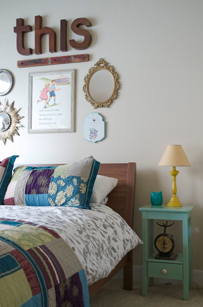 Photo of an eclectic bedroom in Dallas with white walls.