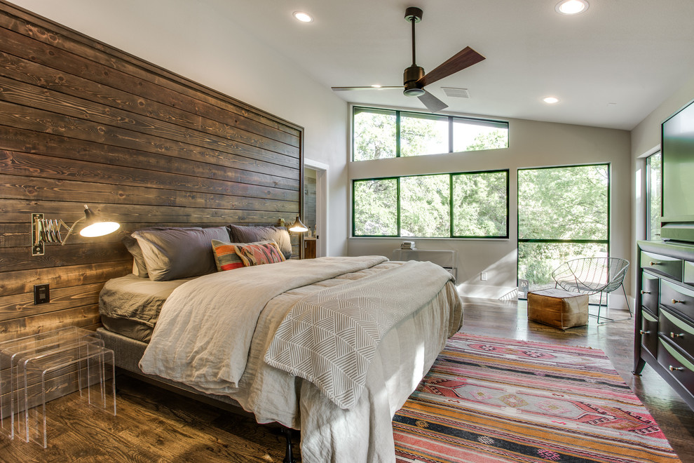 Example of a southwest master dark wood floor bedroom design in Dallas with white walls