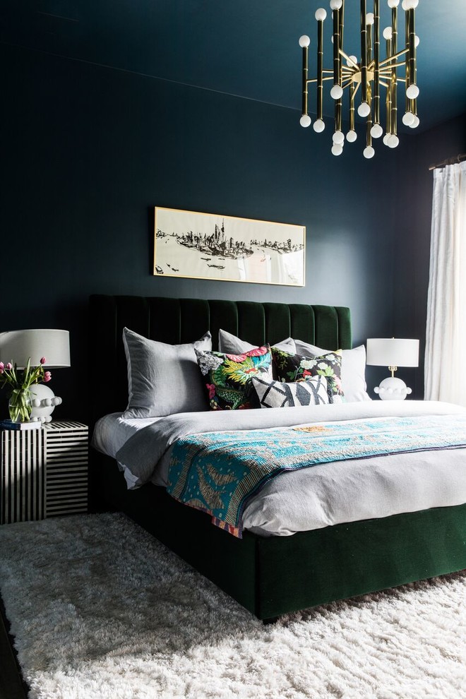 Photo of a traditional bedroom in Charlotte with blue walls.