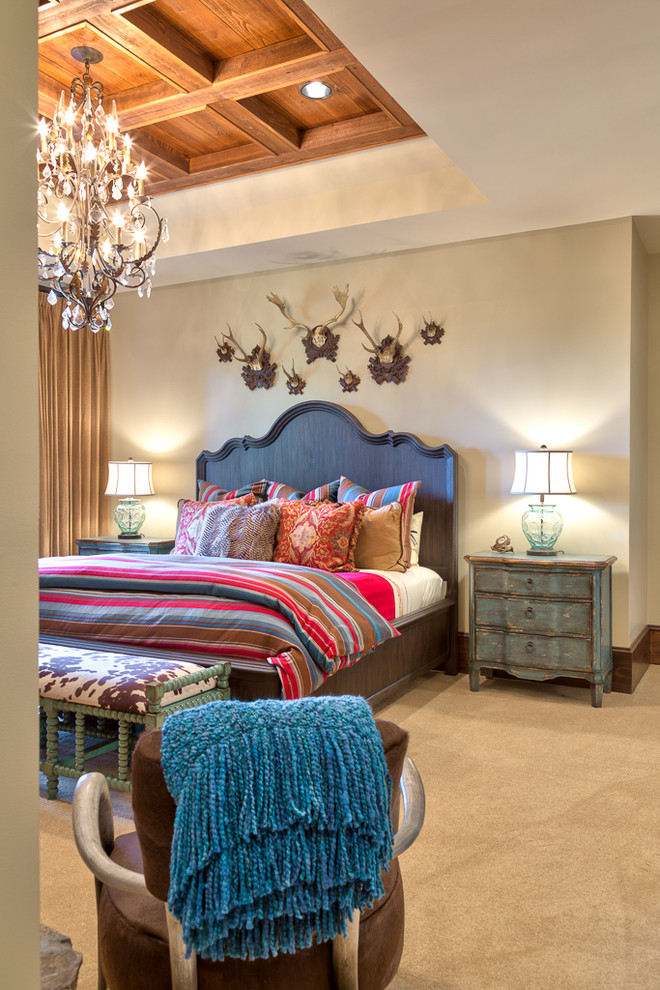 Inspiration for a large rustic guest bedroom in Charlotte with beige walls, carpet and beige floors.