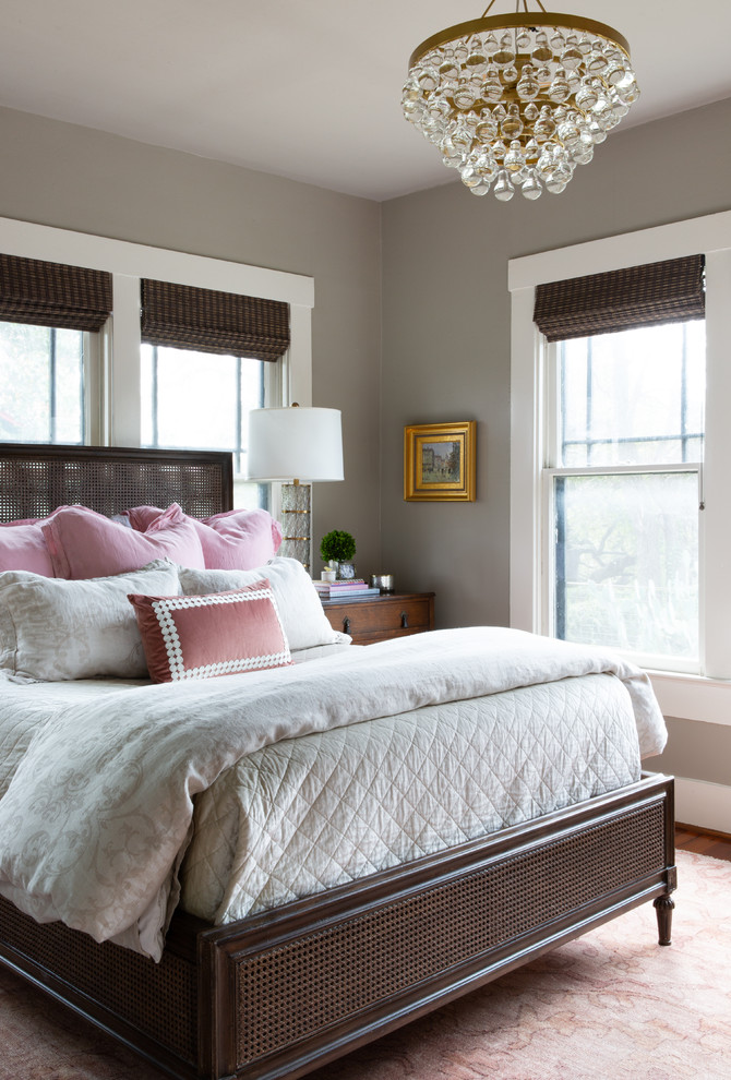 This is an example of a medium sized traditional master and grey and brown bedroom in Austin with grey walls, medium hardwood flooring and brown floors.