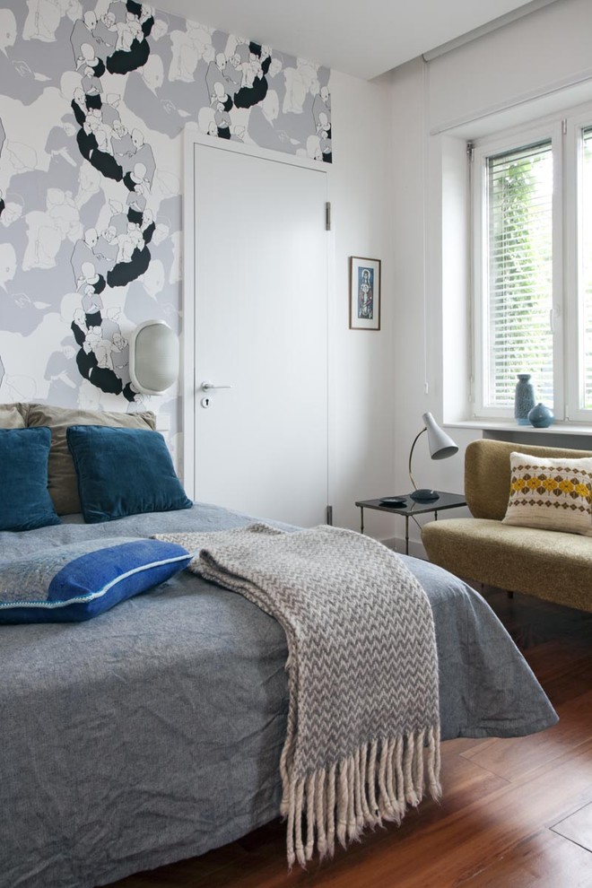 Example of an eclectic bedroom design in Other with white walls