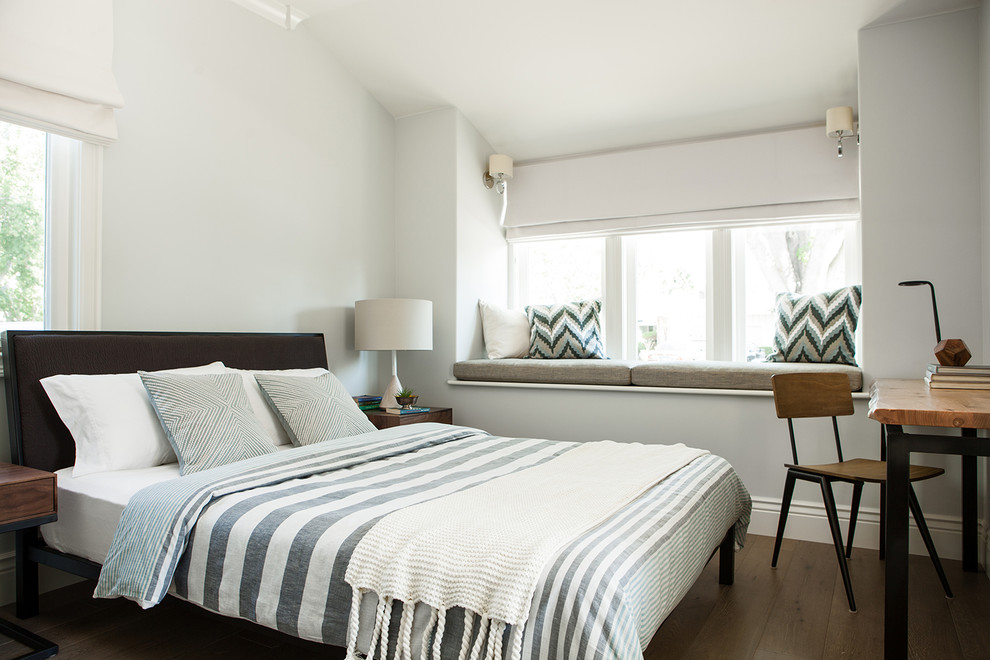 Bedroom - mid-sized modern guest medium tone wood floor bedroom idea in San Francisco with gray walls