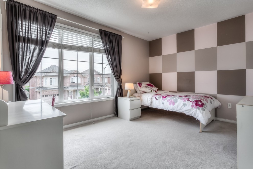 Photo of a medium sized classic guest and grey and pink bedroom in Toronto with pink walls and carpet.