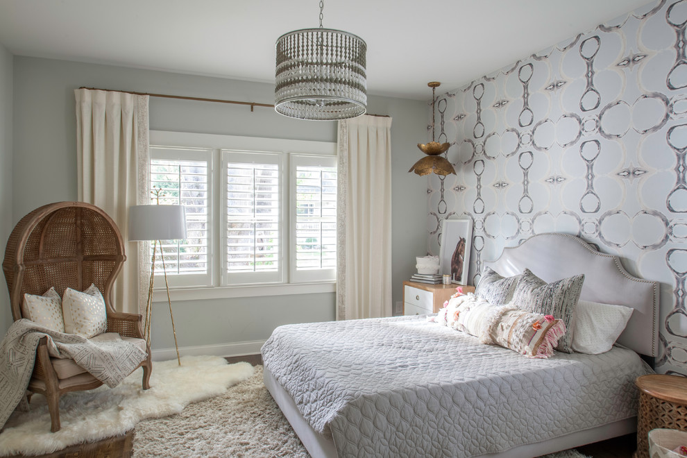Example of a transitional bedroom design in Charlotte