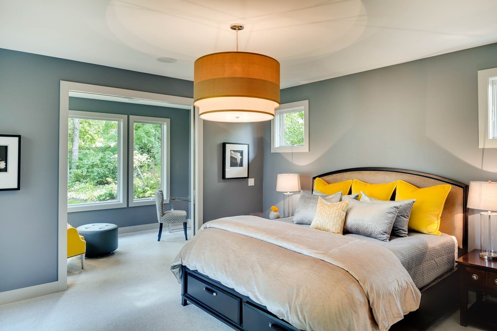 Example of a large trendy master carpeted bedroom design in Minneapolis with gray walls and no fireplace