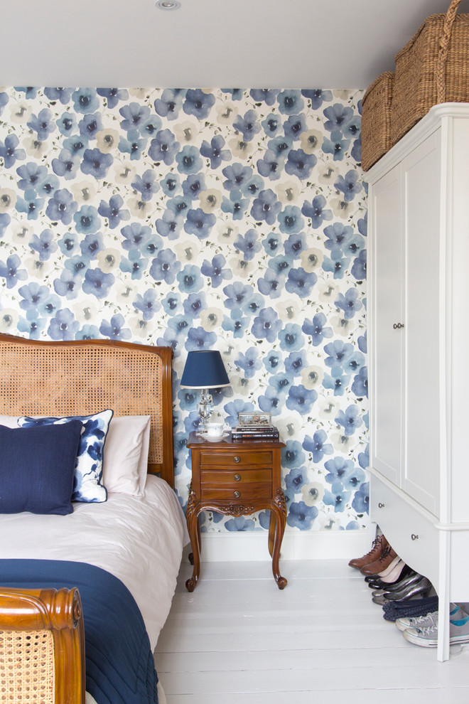 Bedroom - mid-sized victorian master painted wood floor and white floor bedroom idea in London with blue walls and no fireplace