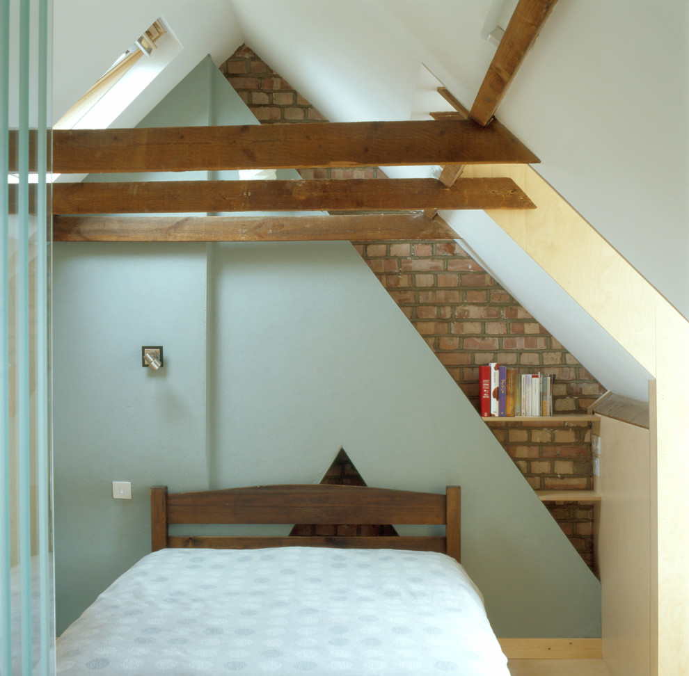 Rustic guest loft bedroom in London.