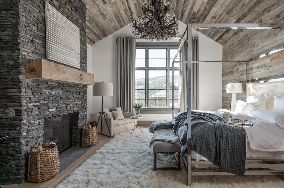 Inspiration for a rustic grey and cream bedroom in San Diego with feature lighting.