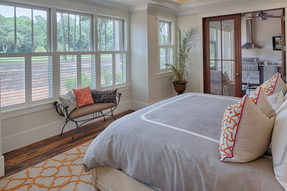 Medium sized rural guest bedroom in Grand Rapids with beige walls and dark hardwood flooring.