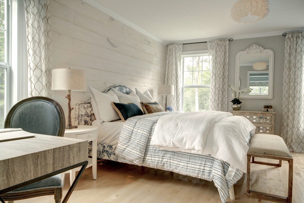 Mid-sized farmhouse master travertine floor and beige floor bedroom photo in Other with gray walls and no fireplace