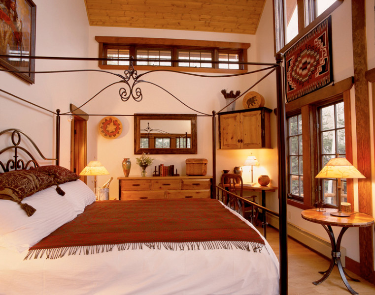 This is an example of a rustic bedroom in Tampa.