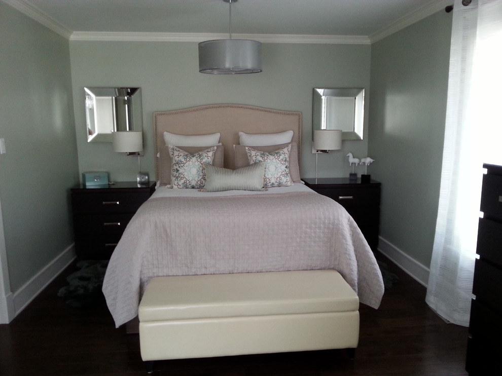 Inspiration for a mid-sized transitional master dark wood floor bedroom remodel in Toronto