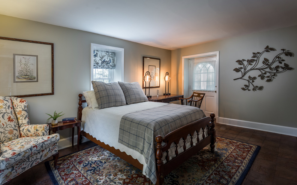 Example of a mid-sized classic guest ceramic tile and brown floor bedroom design in DC Metro with brown walls and no fireplace