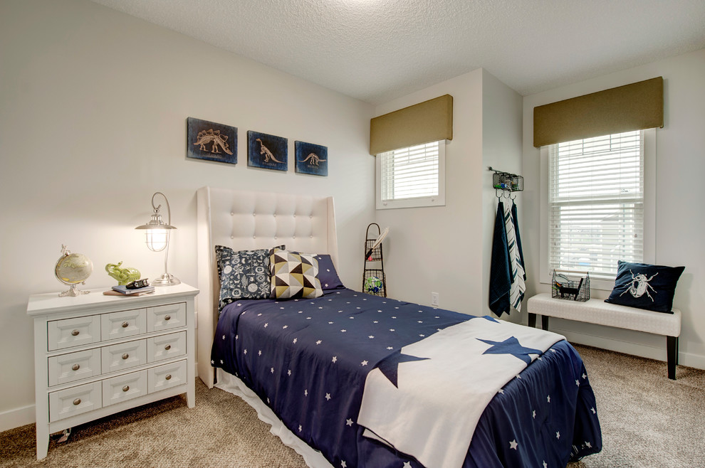 Photo of a small traditional guest bedroom in Edmonton with white walls, carpet and brown floors.