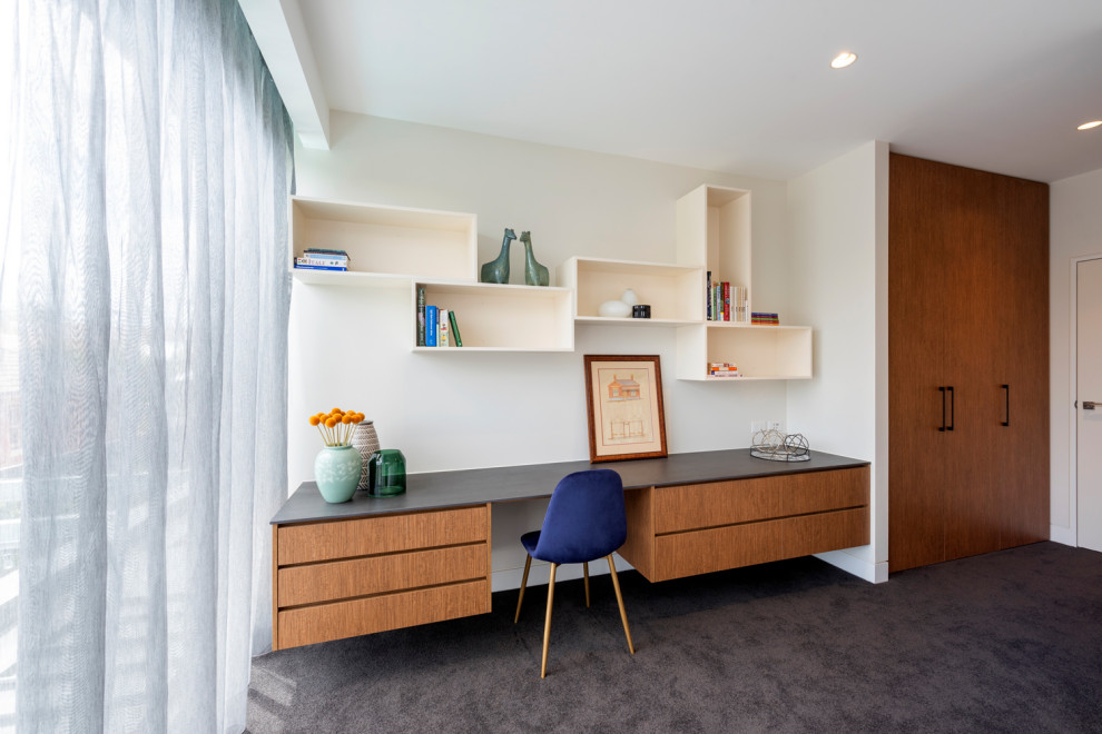 Ispirazione per una camera da letto contemporanea di medie dimensioni con moquette e pavimento grigio