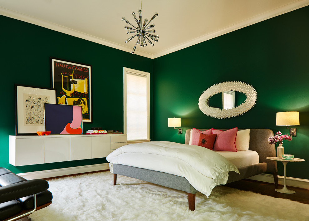 Foto di una camera da letto contemporanea con pareti verdi