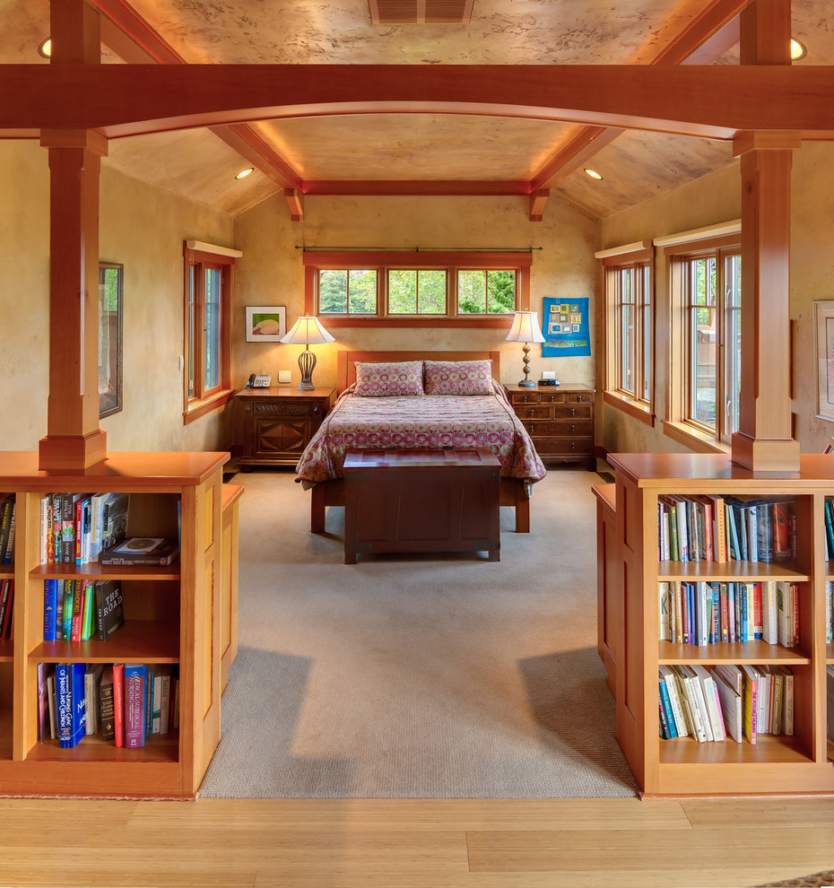 Bedroom - traditional medium tone wood floor bedroom idea in Other with beige walls