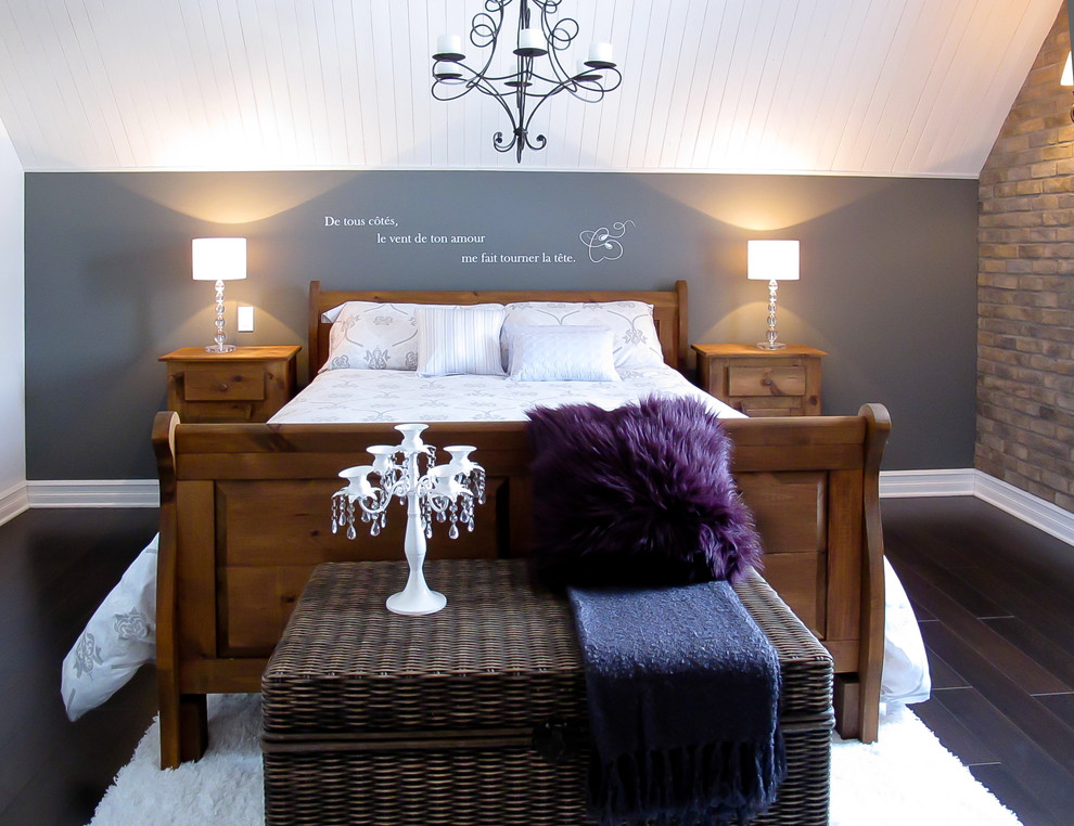 Example of a trendy dark wood floor bedroom design in Montreal with gray walls