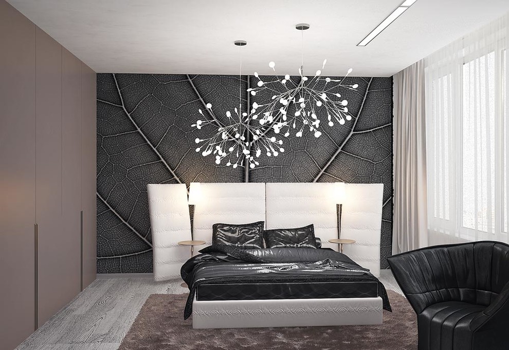 Foto på ett litet funkis sovrum, med grå väggar och ljust trägolv