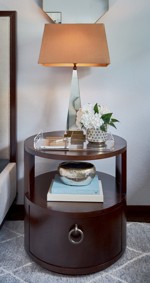 Mid-sized transitional master medium tone wood floor bedroom photo in San Francisco with blue walls