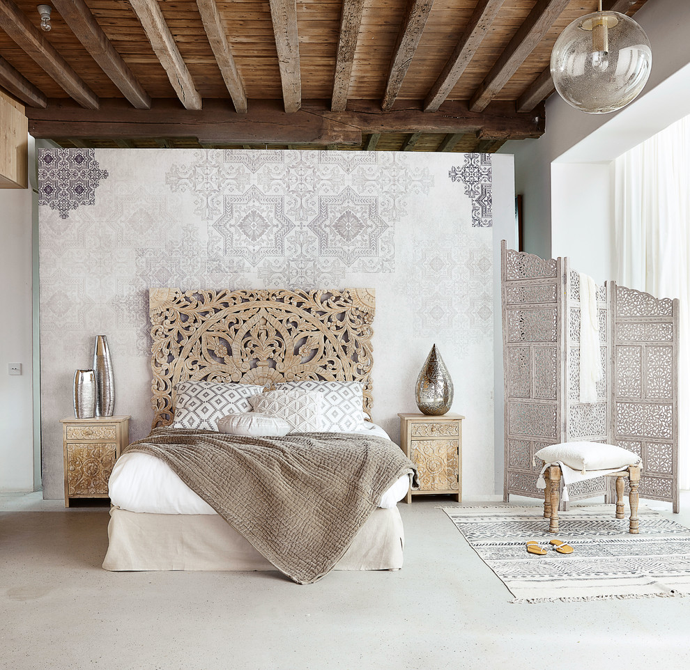 Example of a tuscan bedroom design in London