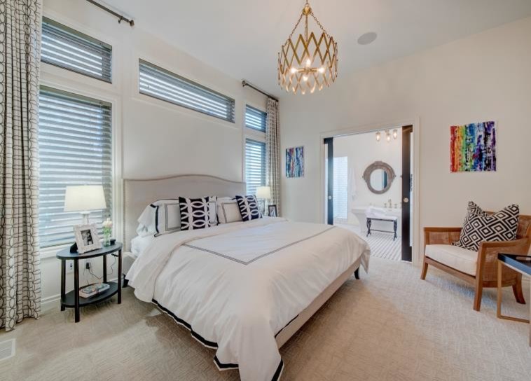 This is an example of a contemporary bedroom in Edmonton.