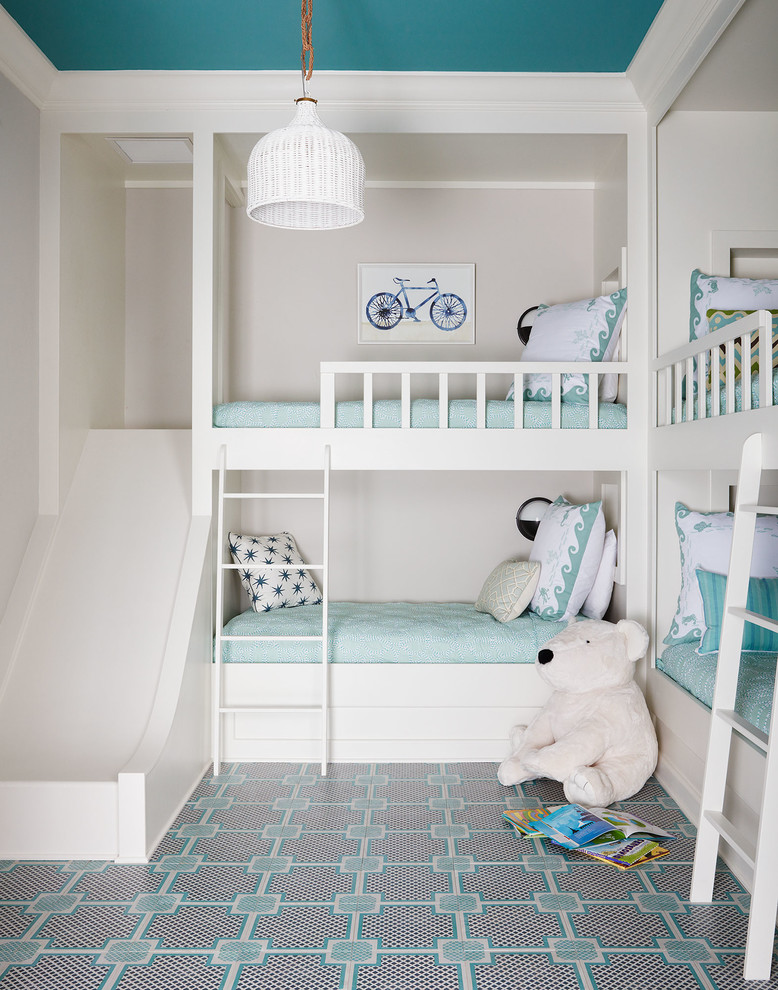 Example of a mid-sized beach style guest carpeted and multicolored floor bedroom design in Jacksonville with white walls