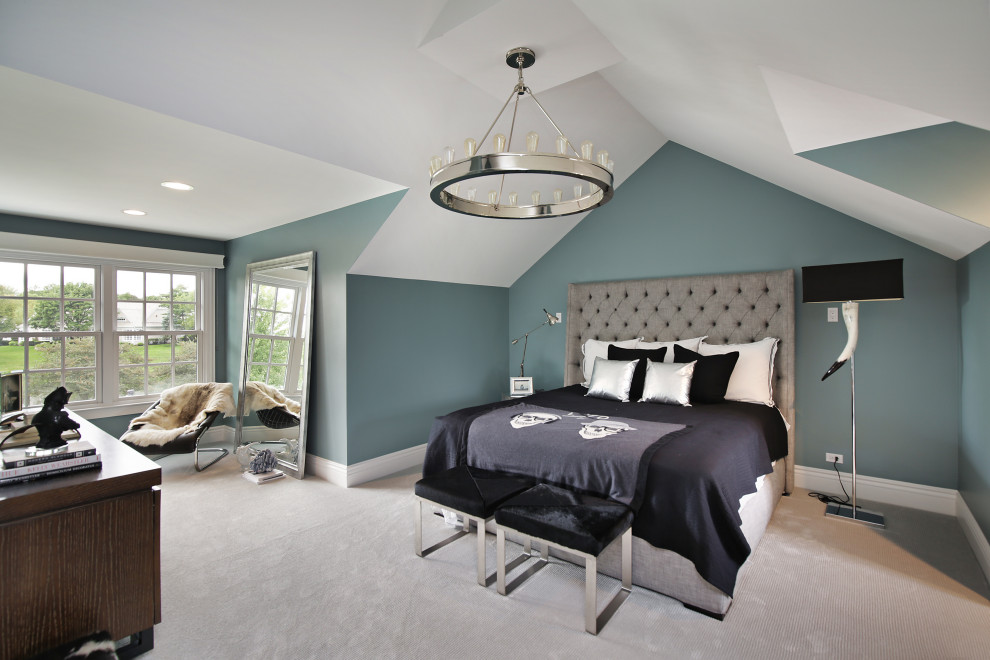 Example of a mid-sized transitional guest carpeted and gray floor bedroom design in Chicago with blue walls