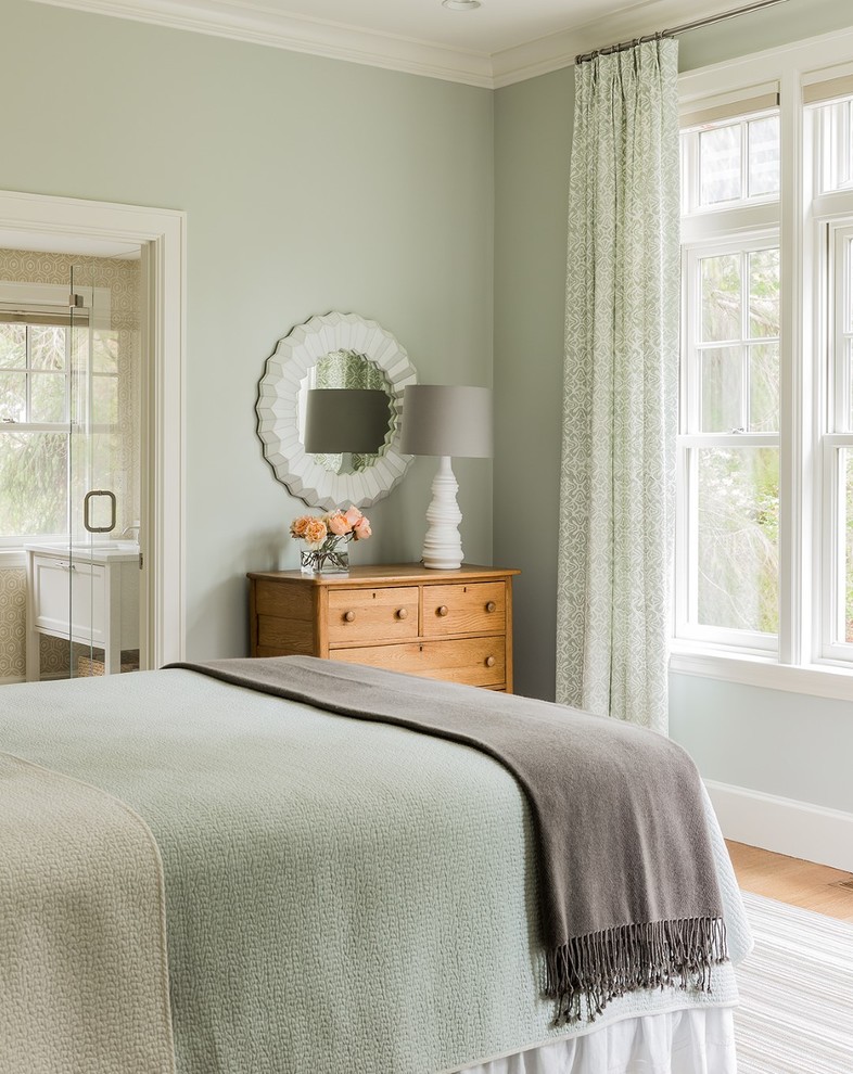 Bedroom - mid-sized transitional guest medium tone wood floor bedroom idea in Boston with green walls
