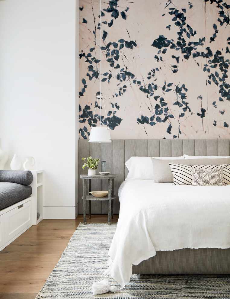 Example of a cottage master medium tone wood floor bedroom design in San Francisco with multicolored walls and no fireplace