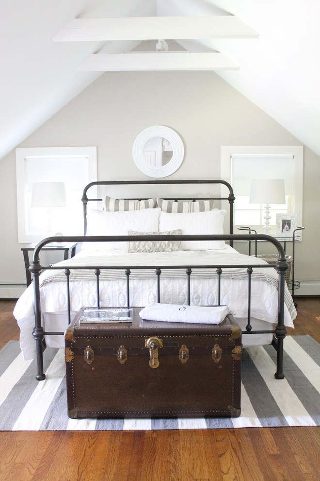 Bedroom - mid-sized farmhouse guest bedroom idea in Other with gray walls
