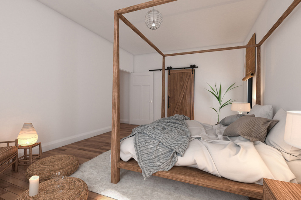 Country Hauptschlafzimmer mit weißer Wandfarbe, braunem Holzboden und braunem Boden in Sonstige