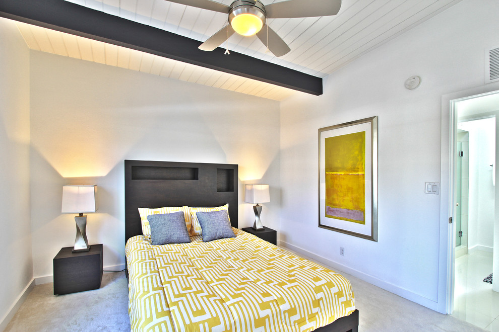 Example of a minimalist bedroom design in Orange County