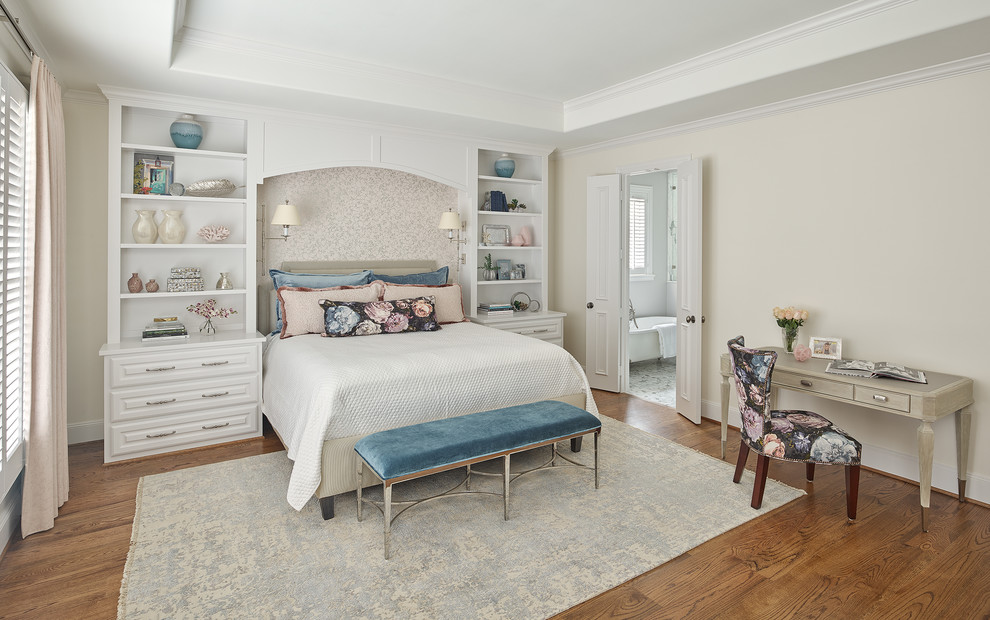 This is an example of a large classic bedroom in Dallas with beige walls, dark hardwood flooring, brown floors, no fireplace and a drop ceiling.